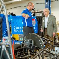Seymour Padnos speaking with an engineering student.
